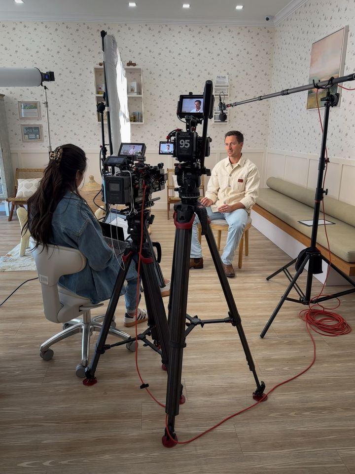 Two EDGEWISE cameras, a boom microphone and a soft light set up for an interview in the Milk Tooth lobby