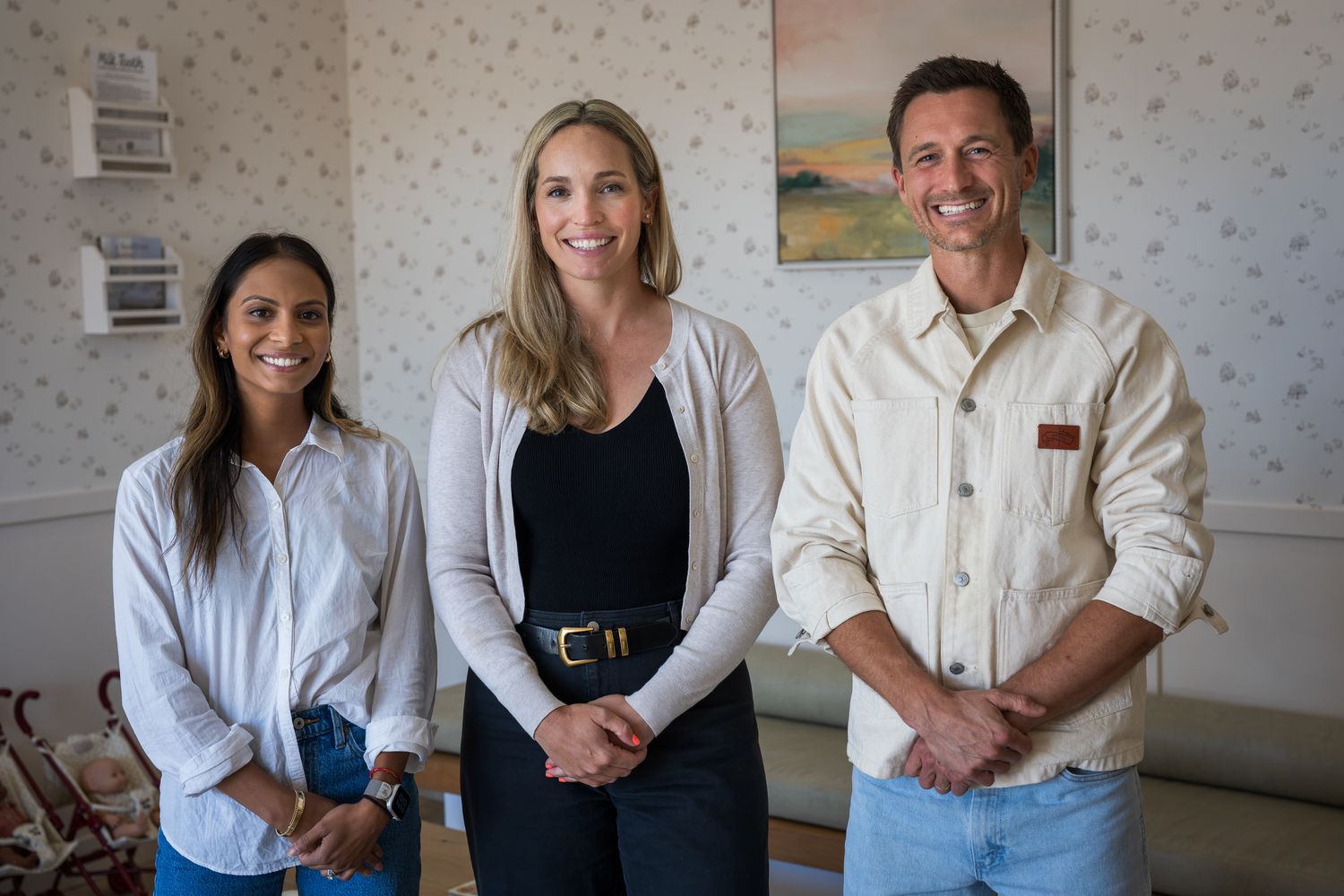 Dr. Niki, Dr. Jess and Dr. Quinn standing together in the Milk Tooth lobby